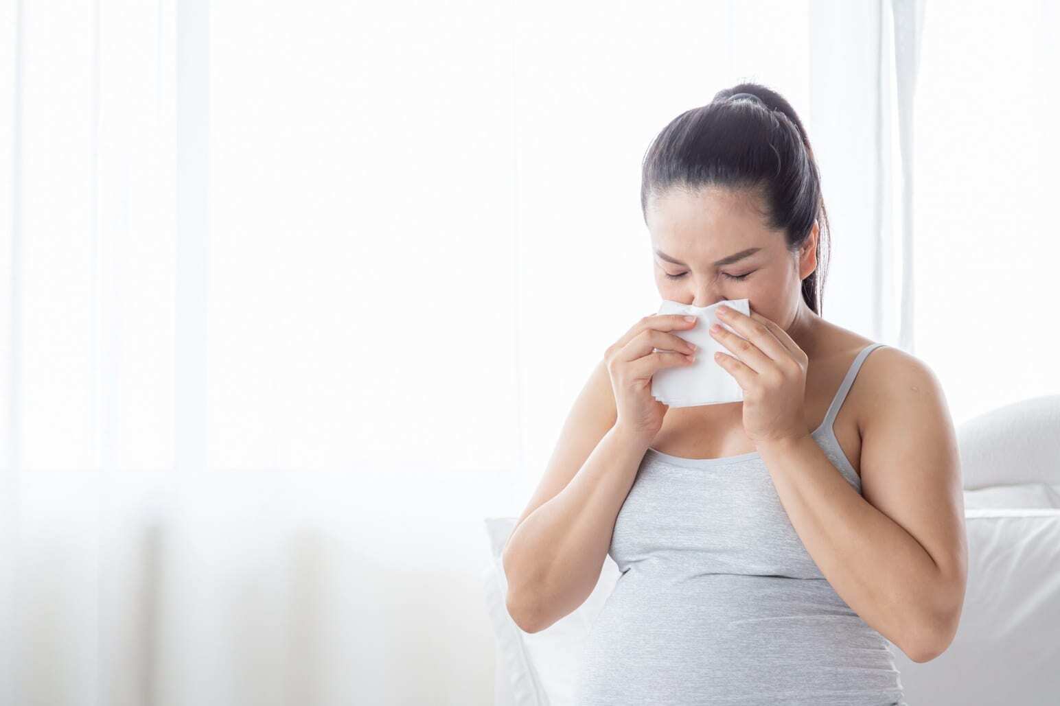 Pregnant woman have morning sickness. Health, medical and maternity concept.