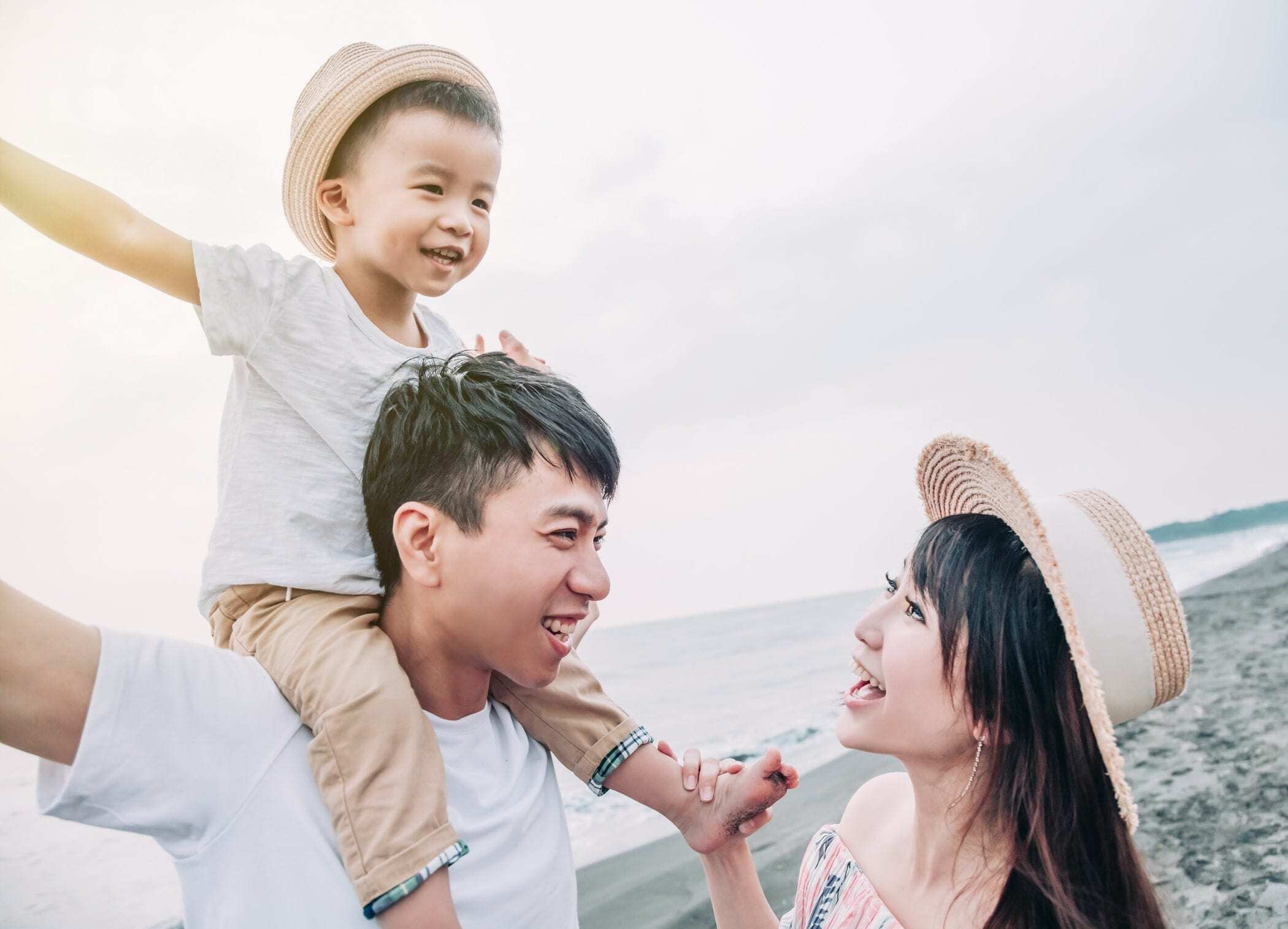 bigstock-Happy-Asian-Family-Playing-On--327902584-min