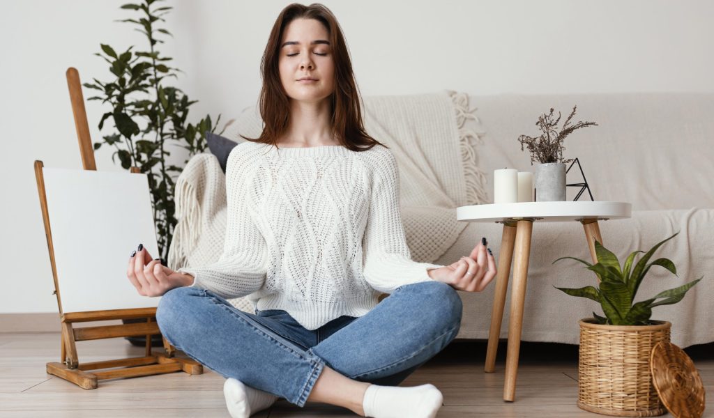 female-meditating-indoor-portrait