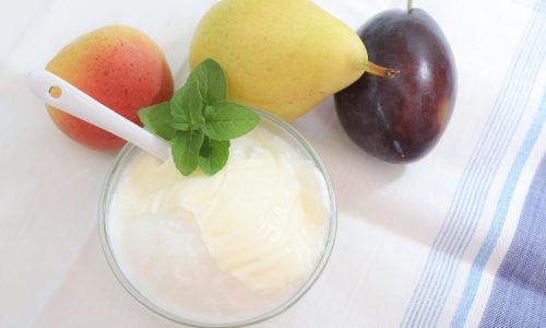 Natural yogurt or yoghurt with cream and fruits